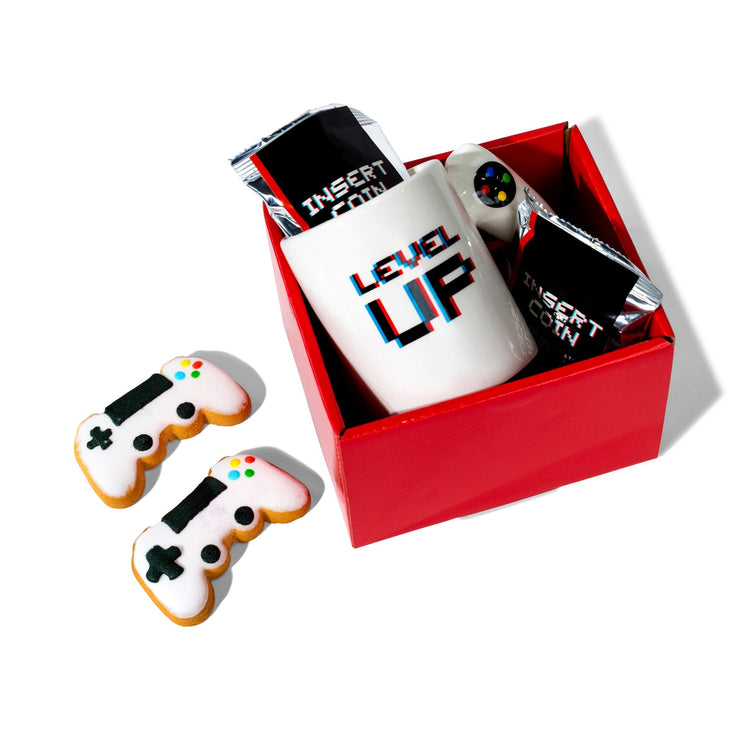 image of gamer gift box open with sugar cookies and hot chocolate mix